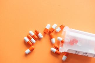 Image of pills and container
